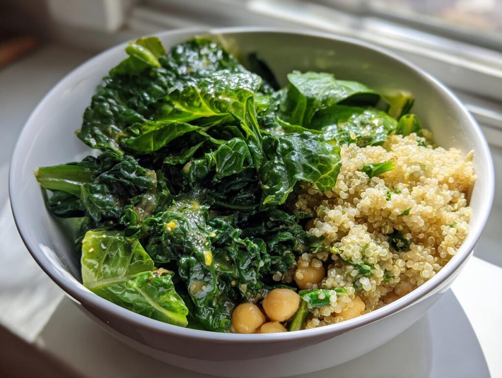 A vibrant bowl of evergreen 2024 recipe featuring fluffy quinoa, wilted greens, and chickpeas.